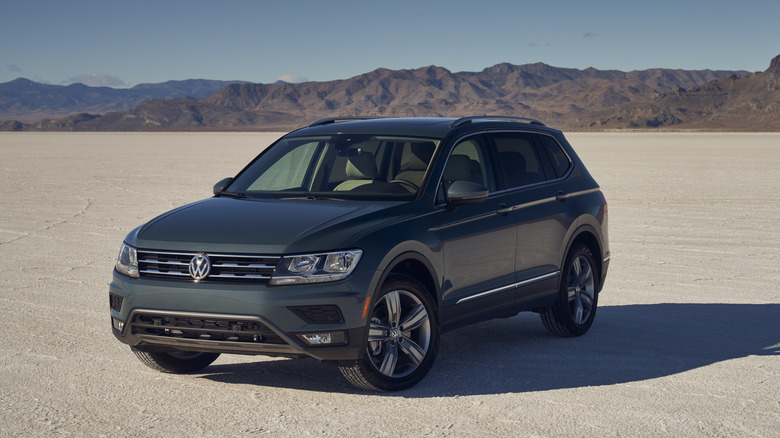 2021 Volkswagen Tiguan parked in the desert on a dry lakebed.