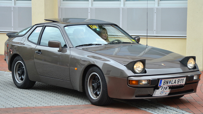 Dark gray 1983 Porsche 944 at a rally in Austria