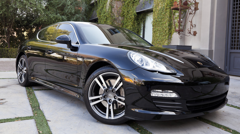 Black Porsche Panamera parked outside