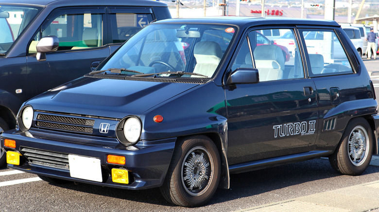 A Honda City Turbo II parked outside