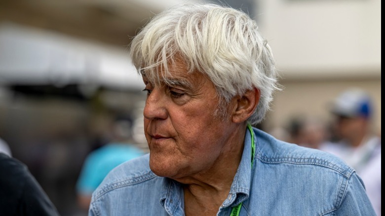 Jay Leno successful a bluish shirt