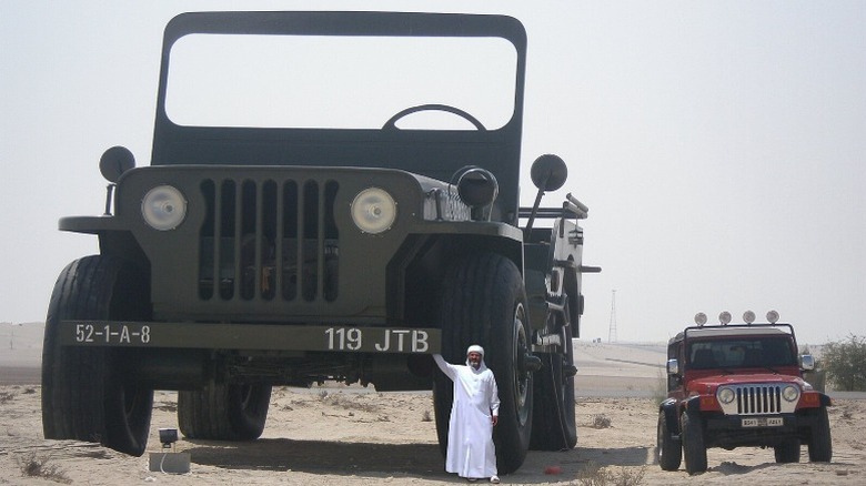 Sheikh Hamad bin Hamdan with a large model of the WIlly Jeep