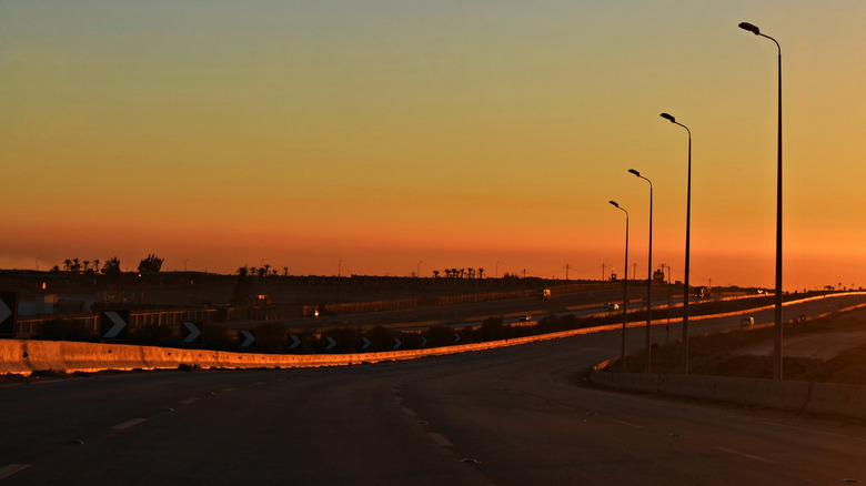 Sunrise in Cairo over a long stretch of Cairo-Dakar Highway