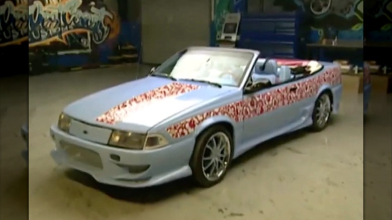 Brooke's 1991 Chevy Cavalier convertible in West Coast Customs garage