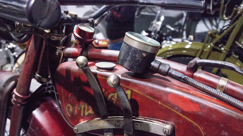 The tank of a red 1927 Indian Ace motorcyle.