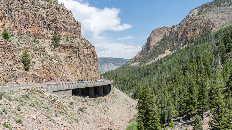 A photograph of a mountain road in Wyoming