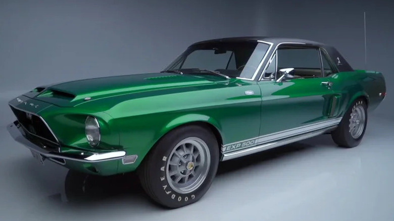 The Emerald Green 1968 Shelby EXP 500 Green Hornet prototype Mustang coupe with black vinyl roof in a studio