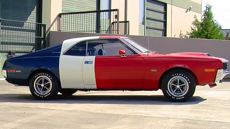 A 1970 AMC Javelin SST Trans-Am Edition in red, white, and blue factory racing livery