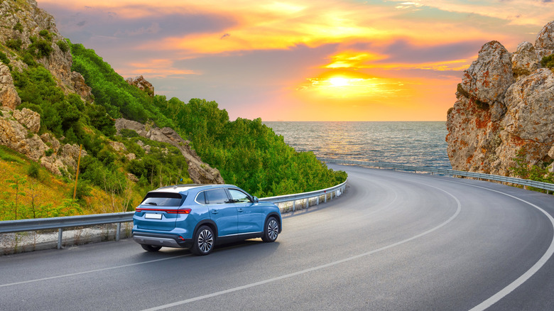 Car driving on coastal road