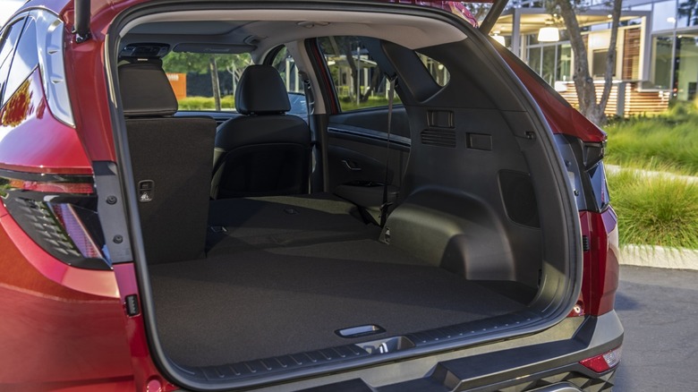 The cargo area of a 2021+ Hyundai Tucson with all rear seats folded flat.