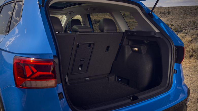 A view into the trunk of a blue Volkswagen Taos.