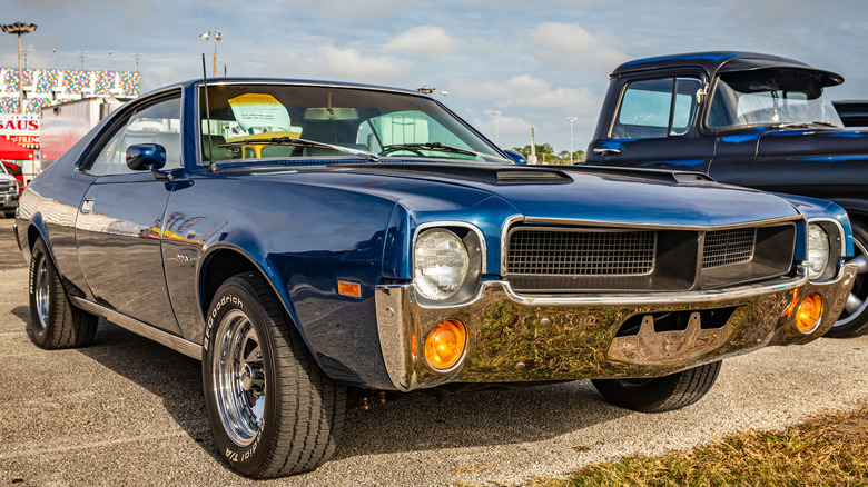 Blue 1968 AMC Javelin parked a car show