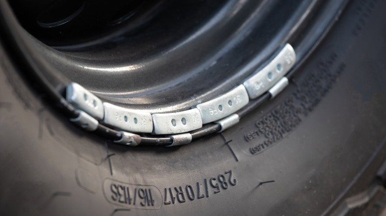 Close-up of lead wheel weights.