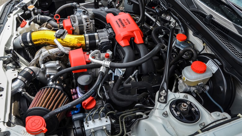 Toyota 86 with red painted engine bay accents.
