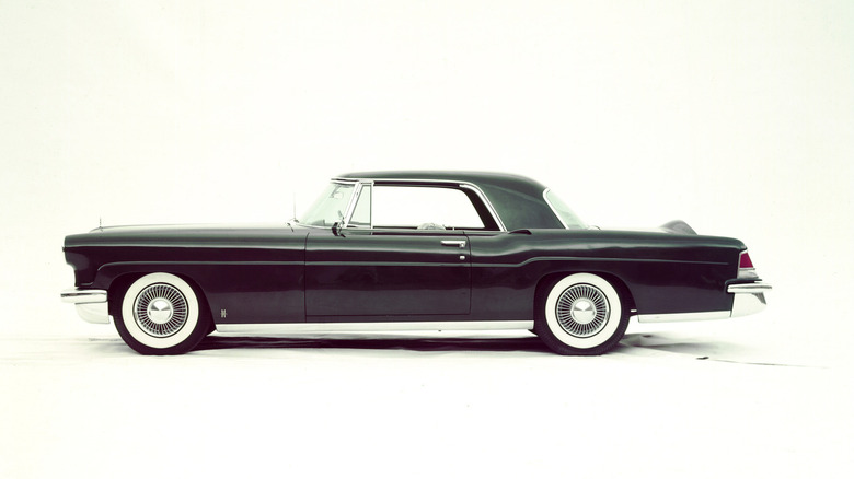 Black 1956 Continental Mark II coupe left side view in studio