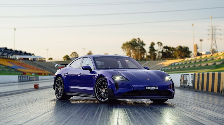 2025 Porsche Taycan Turbo GT Weissach package on drag strip front 3/4 view