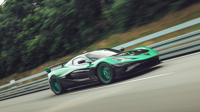 2025 Rimac Nevera R driving at speed front 3/4 view