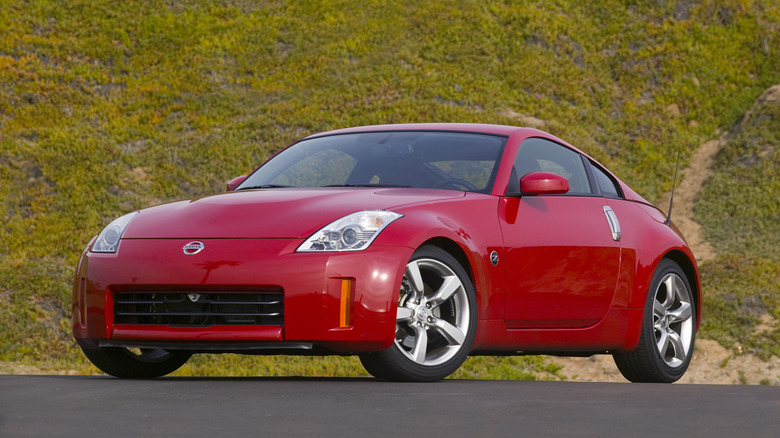 Red 2006 Nissan 350Z Coupe, front 3/4 angle press shot.