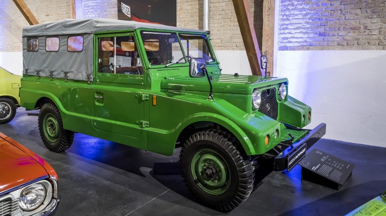 A green Mazda Pathfinder XV-1 in a building