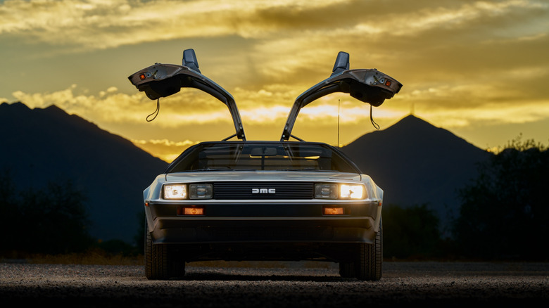 DeLorean DMC-12 parked showing nan doors unfastened beforehand view