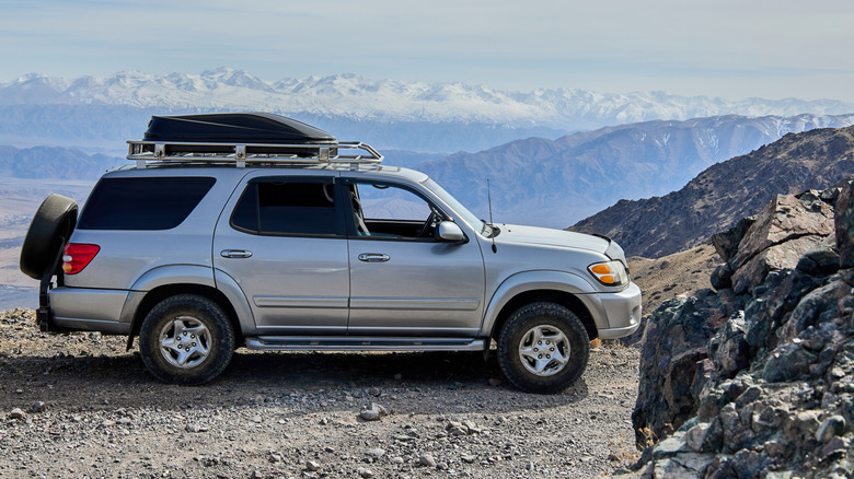 A Toyota Sequoia is parked in the mountains.