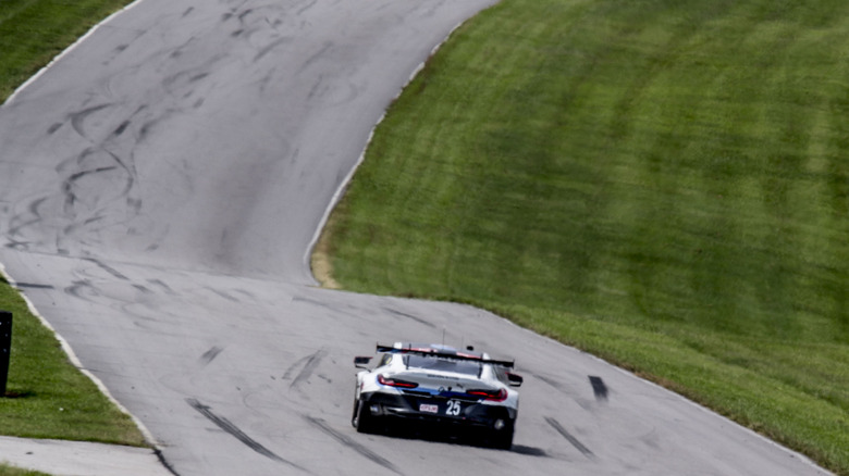 A car races on the track at Virginia International Raceway.