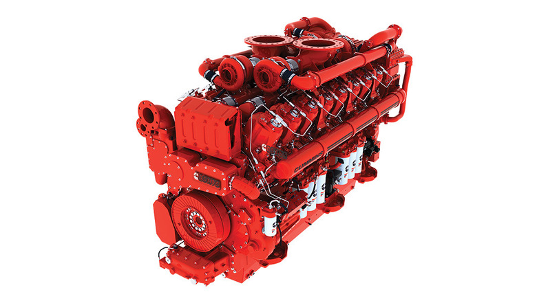 Red Cummins QSK95 diesel  V16 engine front 3/4 view on white background