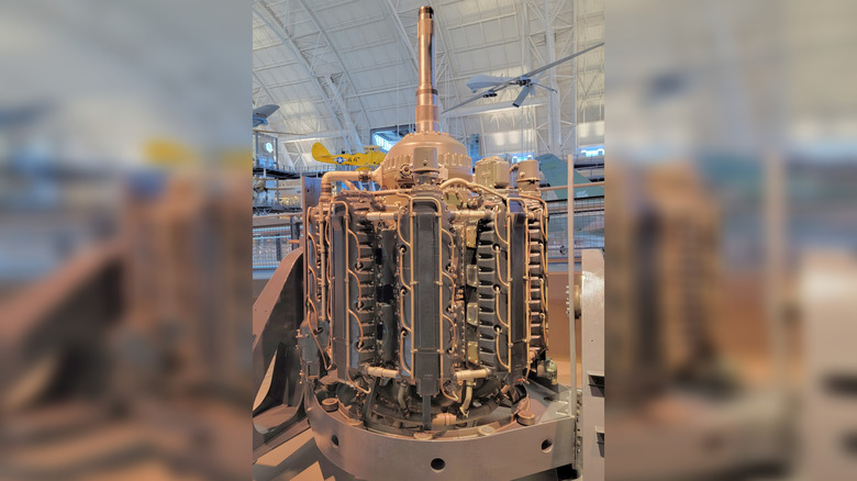 Lycoming XR-7755, the world's largest piston aircraft engine, is shown vertically, revealing its nine banks of four inline cylinders.