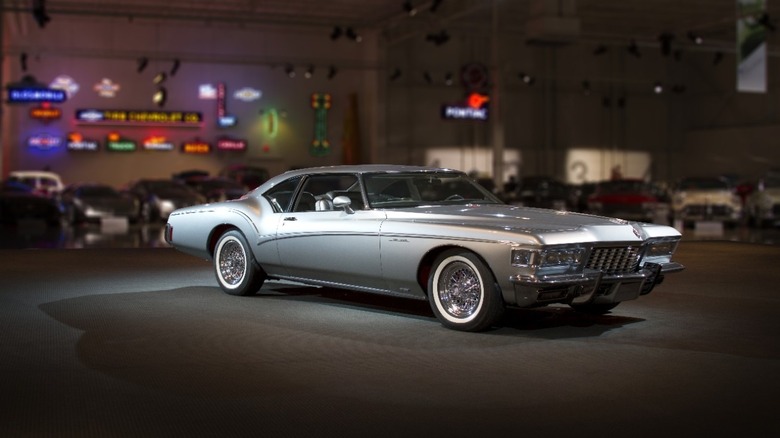 A silver early 1970s Buick Riviera concept parked at GM's heritage museum.
