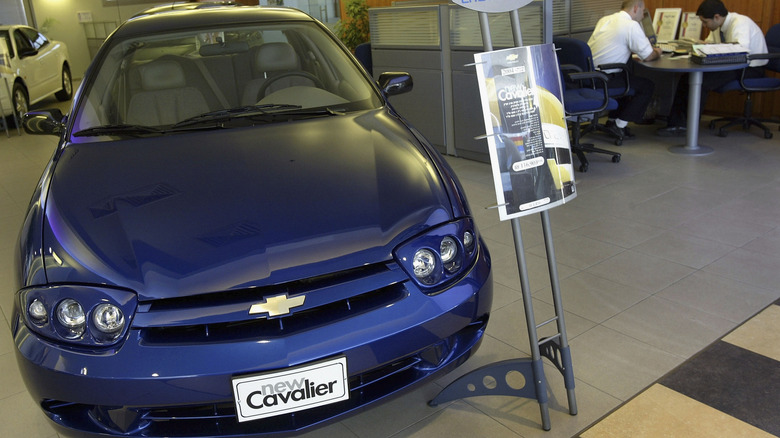 Chevy Cavalier sedan in a dealership.