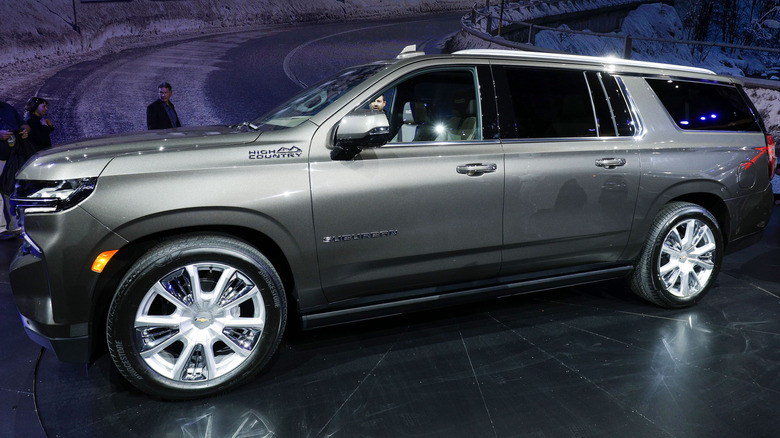 Chevy Suburban parked at a car show