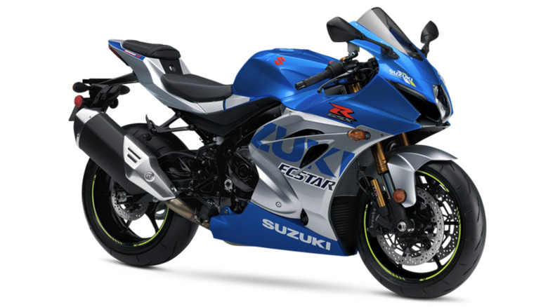 A blue and silver Suzuki GSX-R1000 in profile against a white background.