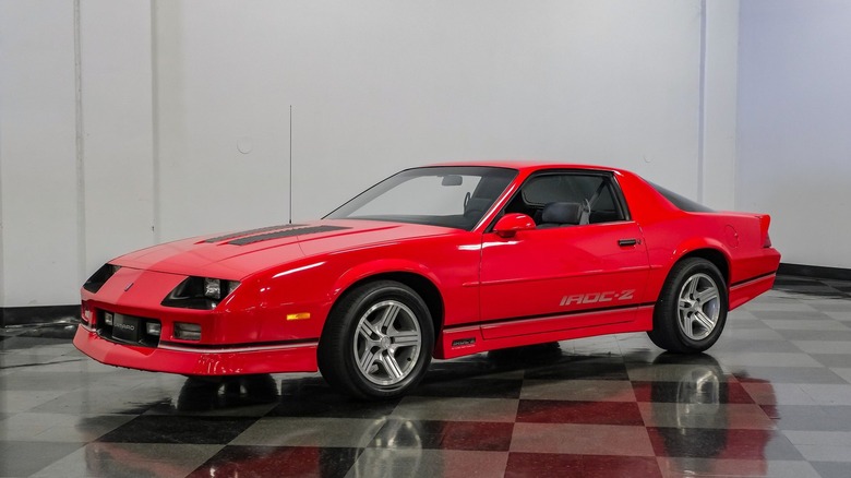 Front 3/4 of Bright Red 1990 Chevrolet Camaro IROC-Z.
