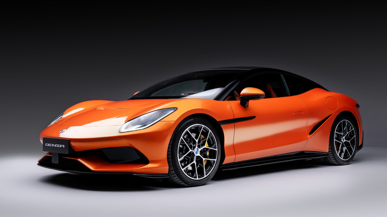 Front 3/4 view of an orange Denza Z