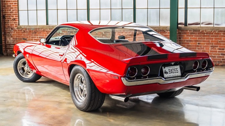 Rear 3/4 view of a red 1970 Chevy Camaro for sale.