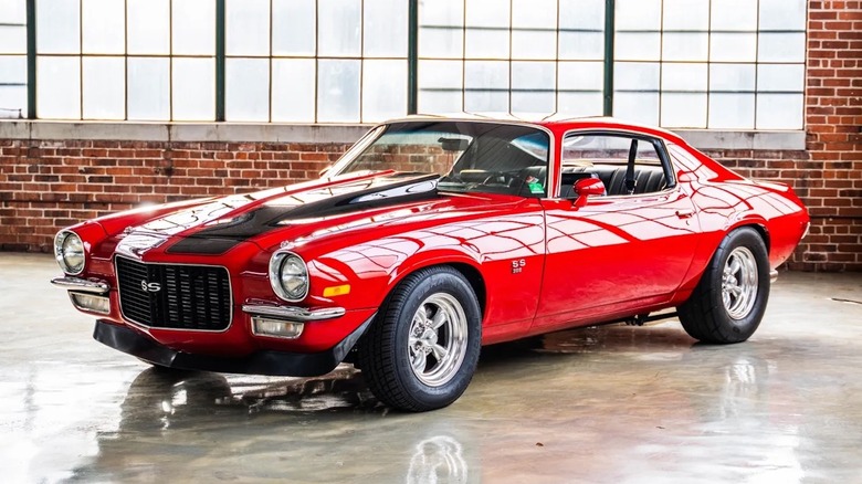 Front 3/4 of a red 1970 Chevy Camaro for sale.