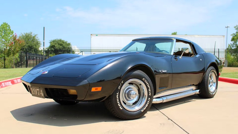 A front-left shot of a black 1974 Corvette Stingray 454 LS4