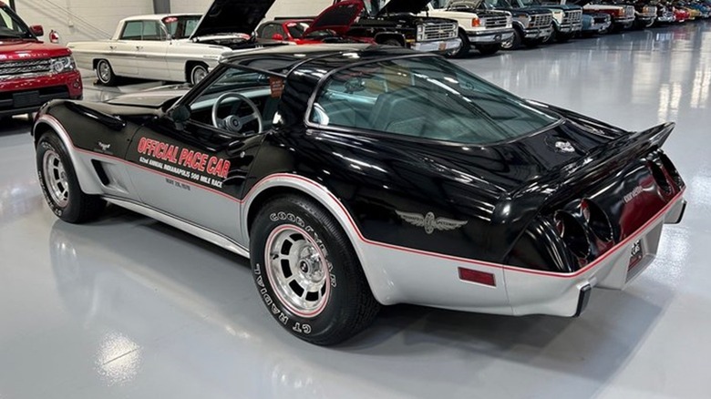 A 57-mile 1978 Chevrolet Corvette Pace Car on a showroom floor from the rear