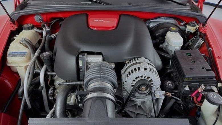 Engine bay of a red 2005 Chevy SSR