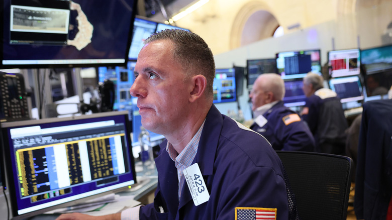 NYSE trader working the floor as the market drops