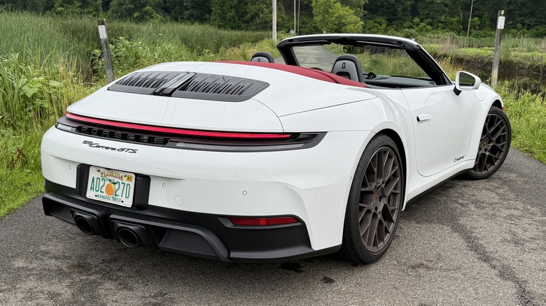 White 2025 Porsche 911 Carrera GTS Cabriolet rear 3/4 view