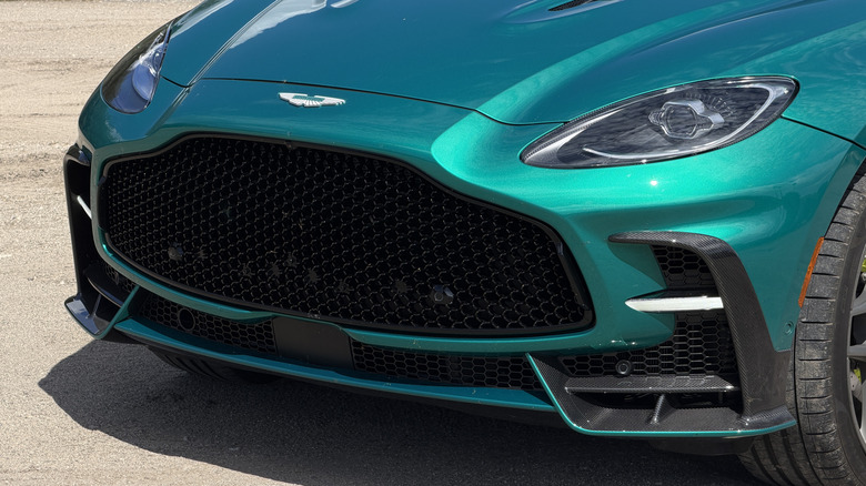 Front grille of a green 2026 Aston Martin DBX S