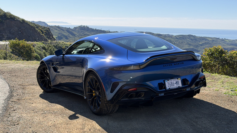 Rear 3/4 view of a blue 2026 Aston Martin Vantage S