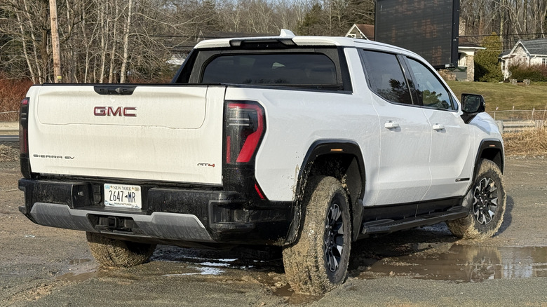 2026 GMC Sierra EV AT4 Max Range rear 3/4 view