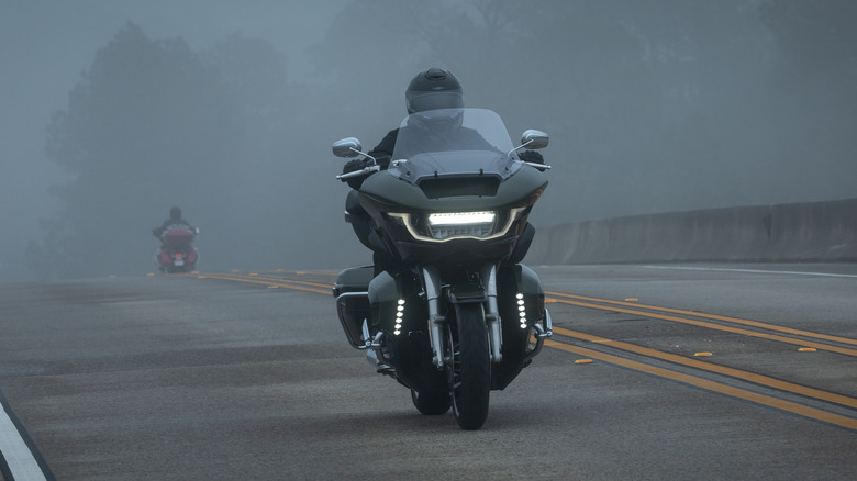 Motorcycles in the fog
