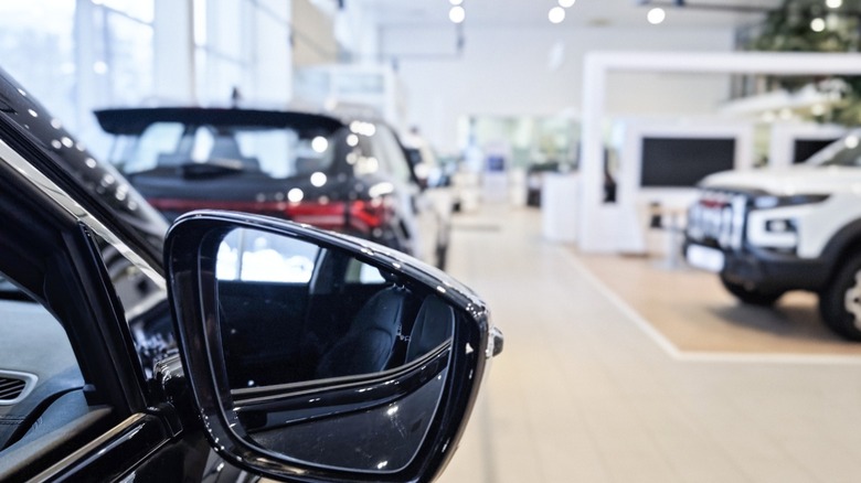 Image of modern car dealership showroom.