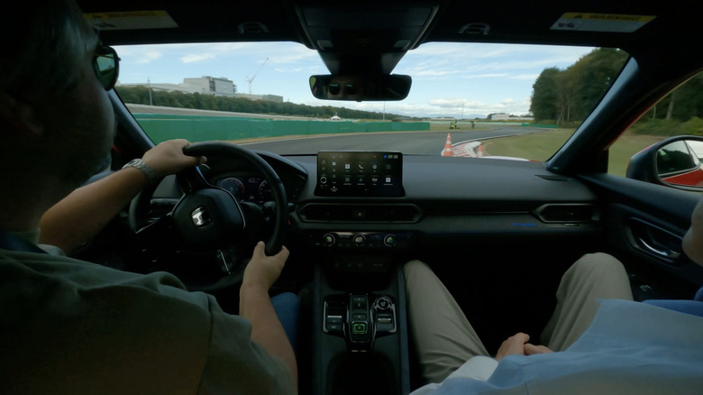 Interior of a 2026 Honda Prelude driving on track