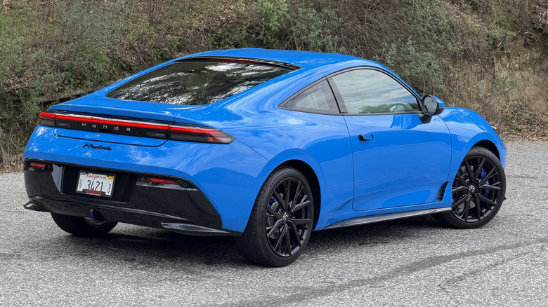 Rear 3/4 view of a blue 2026 Honda Prelude