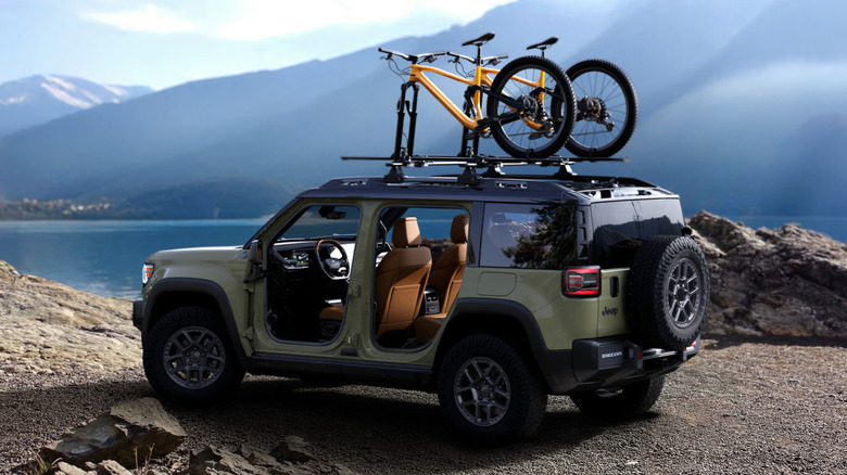 Rear 3/4 view of a green 2026 Jeep Recon Moab