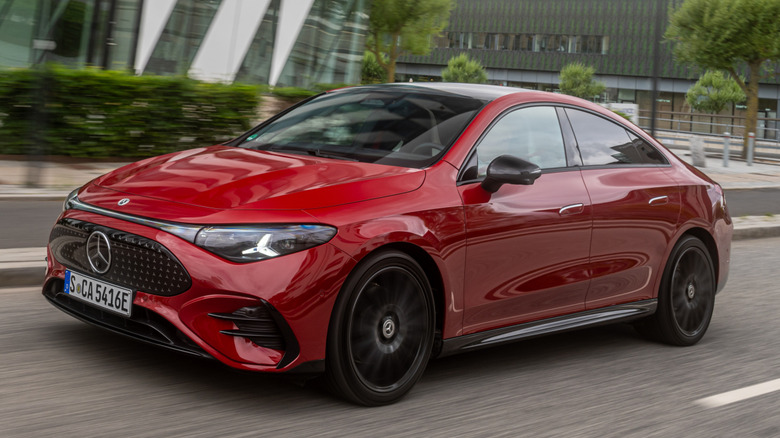 front 3/4 view of a red 2026 Mercedes-Benz CLA EV